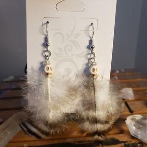 Handmade skull earrings with feathers
